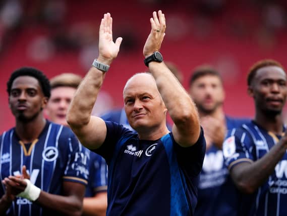 Millwall manager Alex Neil applauds the crowd