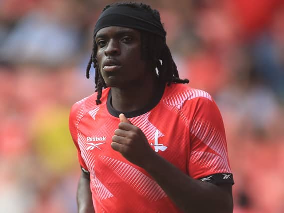 Tyreece Campbell warms up ahead of Charlton's game against Derby