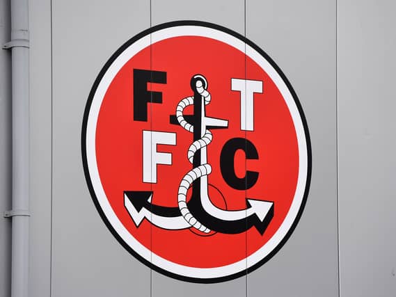 The Fleetwood Town logo on the stadium