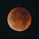 The "Blood Moon" is pictured during an eclipse in the night sky in Shanghai on 8 September 2025.