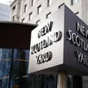 New Scotland Yard sign outside the Metropolitan Police headquarters in London
