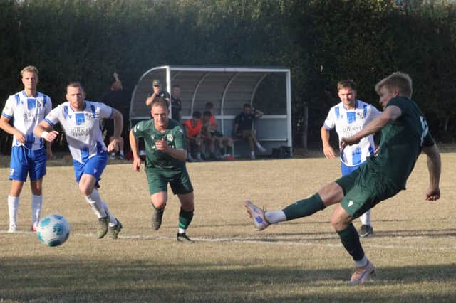Joey Price converts a penalty in Radnor Valley's midweek draw against Kerry (Picture: Stuart Townsend)