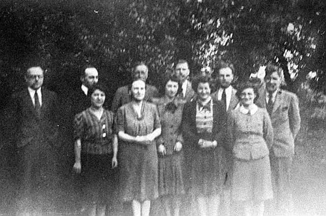 French refugee Hortense Osmont, front left, at Prospect House, Horsehay, around 1944. Back row, second from right, is Jack Clayton, with his wife Joan second from right in the front row. The second woman from left is Jack's mother Dora, with her husband Frank Clayton immediately behind her. 
