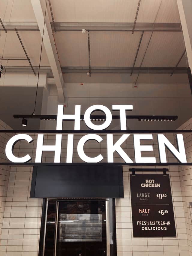 The store features a hot chicken counter.