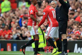 Manchester United’s Wayne Rooney replaces Marcus Rashford during a Premier League match at Old Trafford,