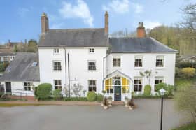 A brick-built gateway leads into the private grounds of this substantial period home in Stirchley Village
