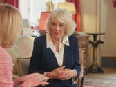 The Queen sitting in Clarence House speaking during filming