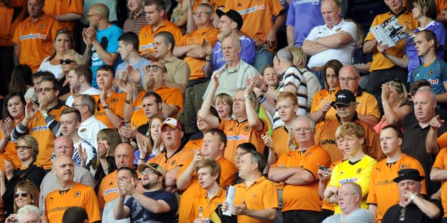 John Bray in the middle of a packed out away end at Deepdale