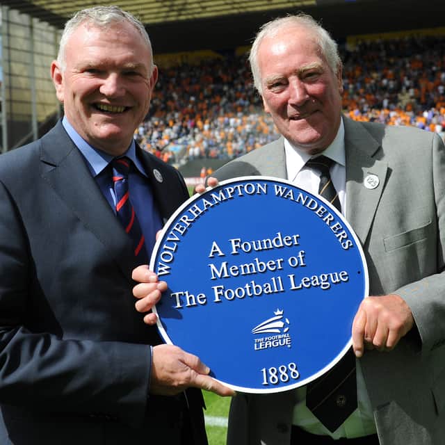 Ron Flowers receives the blue plaque awarded to Wolves to mark their status among the Football League founders