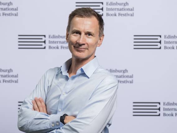 Sir Jeremy Hunt with his arms folded