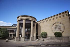 Exterior view of the High Court Glasgow under blue skies