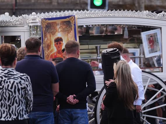 The funeral cortege for Joe Carthy, 15, arrives at St Michael the Archangel Church in Athy