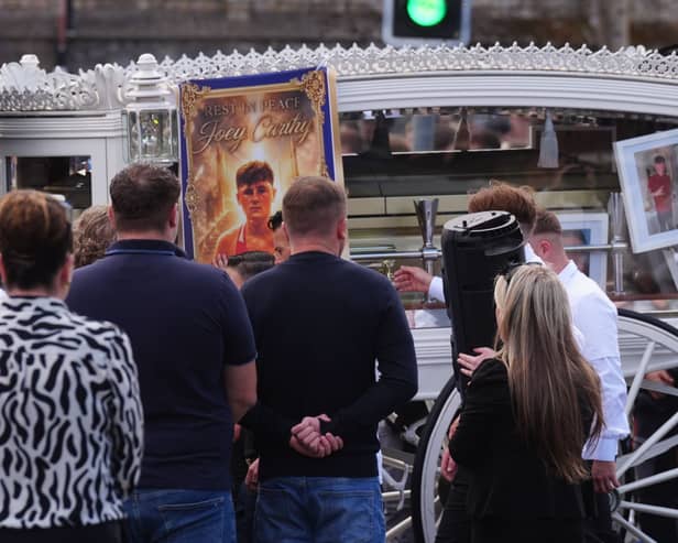 The funeral cortege for Joe Carthy, 15, arrives at St Michael the Archangel Church in Athy
