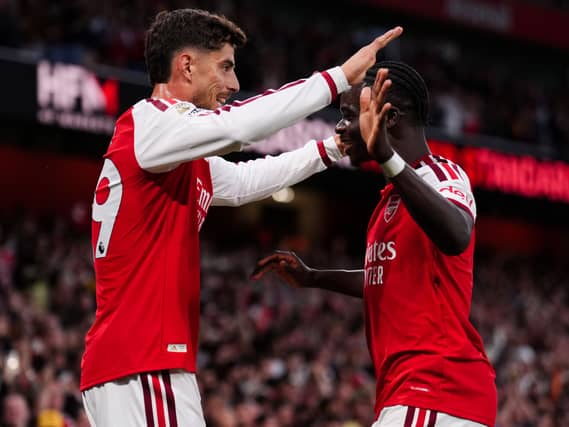 Arsenal’s Kai Havertz, left, celebrates with Bukayo Saka after scoring the opening goal against Coventry