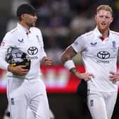 England’s Joe Root, left, speaks with Ben Stokes in the field during the 2025 Ashes
