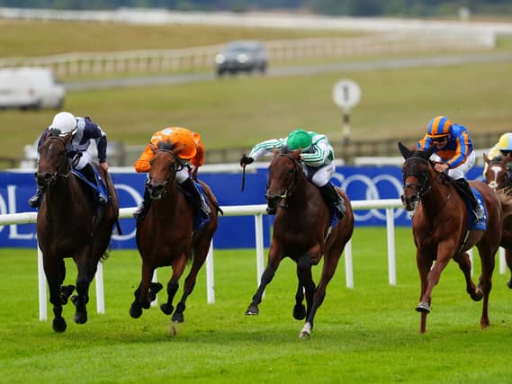 Green Empress (green cap) and Dylan Browne McMonagle win at the Curragh