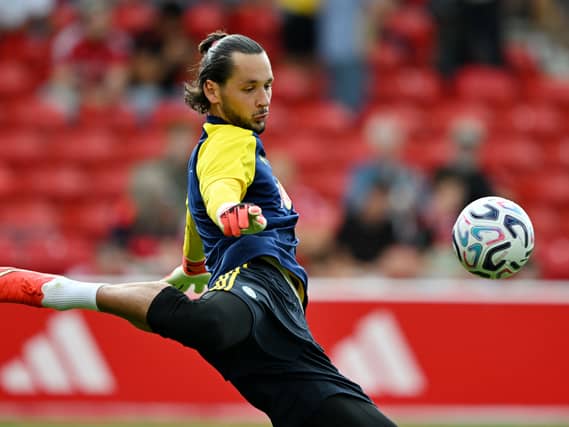 Leeds goalkeeper James Trafford warms up
