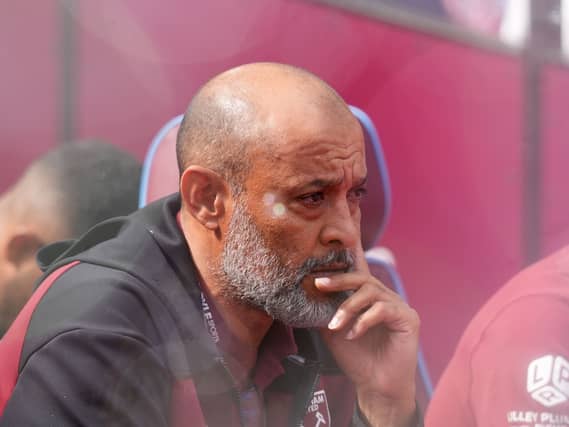 West Ham manager Nuno Espirito Santo sits in the dugout