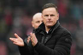 Leyton Orient manager Richie Wellens applauds the fans