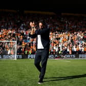 Wolves boss Cesar Peixoto celebrates with Wolves fans