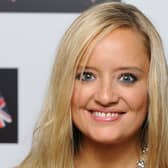 Lucy Davis wearing a silver gown with two necklaces and her hair out at the British Comedy Awards 2008