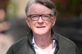 Lord Peter Mandelson smiles at the camera