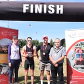 Lisa Cook (Charcroft Electronics) presents an age category award to Mackenzie Tyler
alongside Hugh Tamlyn (Wales Air Ambulance) and Councillor Alan Waller, Mayor of Builth Wells. 