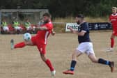 The ball is cleared during Knighton Town's 1-1 draw with Llanfair United Pictures: Stuart Townsend