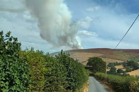 Smoke from the Glascwm wildlife is visible from a number of miles away