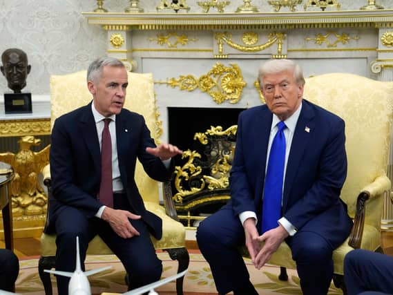 Canadian Prime Minister Mark Carney and US President Donald Trump hold a press conference at the White House in Washington