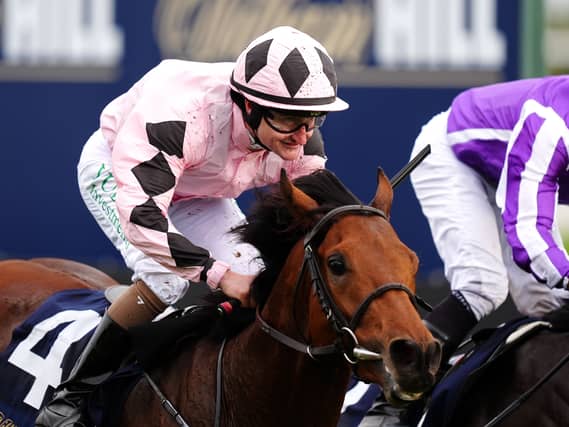 Hotazhell ridden by Shane Foley on their way to winning the William Hill Futurity Trophy at Doncaster