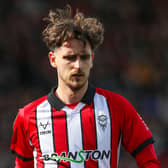 Tom Bayliss in action for Lincoln
