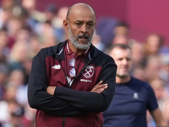 Nuno Espirito Santo looks on