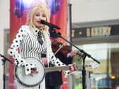 Dolly Parton playing the banjo