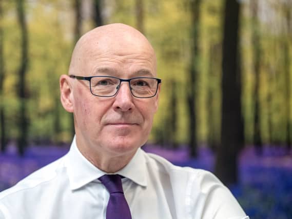 John Swinney smiling