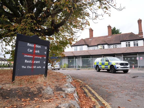 Police outside the Bell Hotel in Epping, Essex when it was used to house asylum seekers
