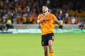 Raul Jimenez in the club's gold home kit