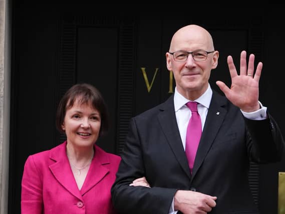 Elizabeth Quigley and John Swinney smiling