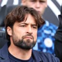 Leicester manager Russell Martin looks on