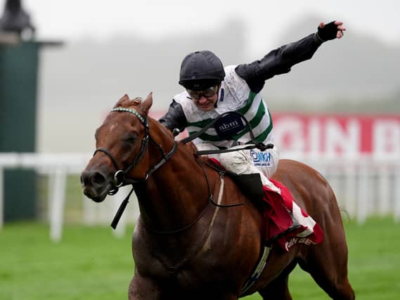 Zavateri and Charlie Bishop winning the Celebration Mile at Goodwood