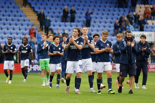 Shrewsbury Town players celebrate the win