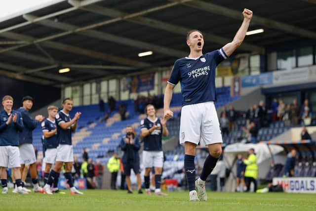 Get in there! Captain Will Boyle celebrates with supporters at full time 
