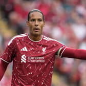 Liverpool captain Virgil van Dijk gestures on the field