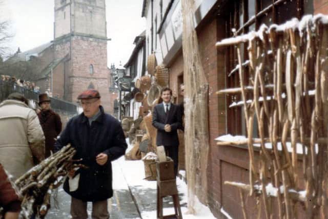David Woollam standing outside what was then the Steak Bar in Fish Street, which was owned by the Prince Rupert Hotel, during the filming in 1984 of A Christmas Carol.