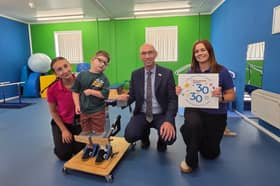 Movement Centre physiotherapist Lara Whitton and head of fundraising Claire Snape (left and right), with three-year-old Percy Whitehead and 30 for 30 fundraiser Nigel West from Fiveways Insurance