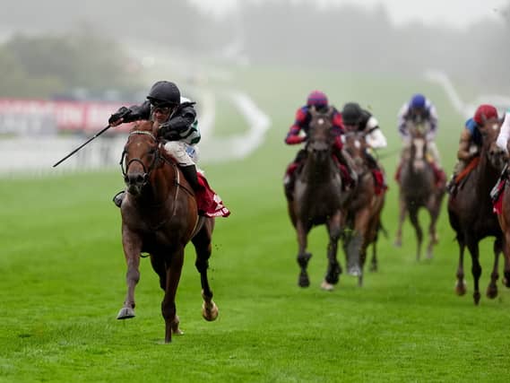 Zavateri and Charles Bishop win the Celebration Mile at Goodwood