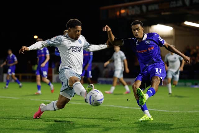 Arkell Jude-Boyd tries to find a way through for Shrewsbury Town