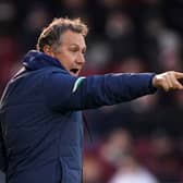 Micky Mellon looks on
