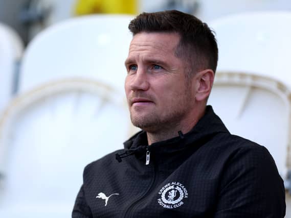 Crewe boss Lee Bell watches from the touchline