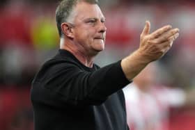 Stoke boss Mark Robins gives instructions from the touchline